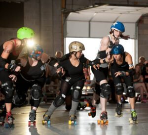 Roller Derby Sport About Passing And Knocking Players Off Of Track